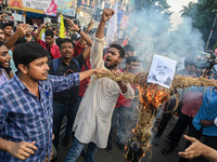 Activists of leftist youth organisations burn an effigy of India's Prime Minister Narendra Modi during a demonstration to protest against th...