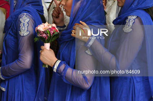 MANILA, Philippines - The bridesmaids prepare to enter the main worship hall, moments before the main ceremonies of a Sikh wedding inside th...