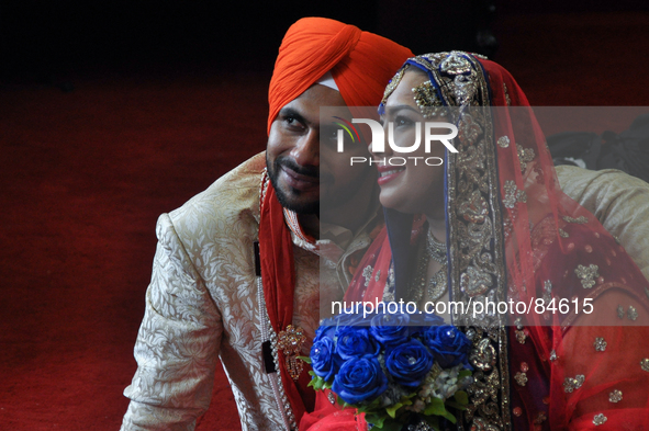 MANILA, Philippines - The bride and groom pose for a photo after the main ceremonies of a Sikh wedding inside the Khalsa Diwan Indian Sikh T...