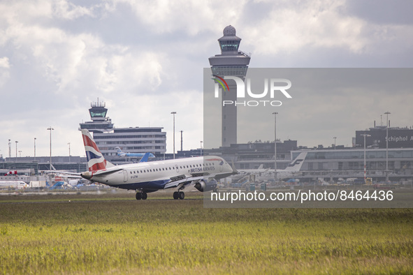 British Airways Embraer ERJ-190 ( ERJ-190-100 SR or ERJ-190SR ) aircraft as seen flying and landing at Amsterdam Schiphol Airport. The narro...