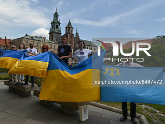 Members of the local Ukrainian diaspora repeat before an attempt to set a world record in the simultaneous performance of 'Red Kalina' in Kr...
