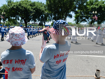 Attendees and participants of the 2022 National Independence Day Parade are decked out in red white and blue in Washington DC on July 4th, 2...