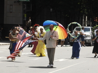 Filipinos march in the Independence Day Parade in Philadelphia, PA, on July 4, 2022. (