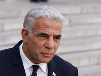 Israel's Prime minister Yaïr Lapid delivers a speech to France's President Emmanuel Macron before their diplomatic meeting at  Elysee Palace...