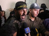 Former Palestinian prisoner Hosni Issa, celebrates with friends and family and Members of Al-Quds Brigades, the military wing of Islamic Jih...