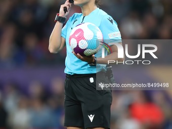 Marta Huerta, the match referee, holds the ball during the UEFA Women's Euro 2022 opening match in Group A between England and Austria at Ol...