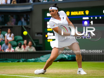 Ons Jabeur of Tunisia in action against Marie Bouzkova of the Czech Republic during the quarter-final of the 2022 Wimbledon Championships, G...