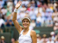 Tatjana Maria of Germany celebrates after winning against Jule Niemeier of Germany during the quarter-final of the 2022 Wimbledon Championsh...