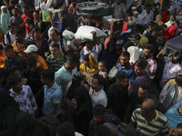 People board crowded ferries as they travel back home ahead of Eid al-Adha, the feast of the sacrifice in Dhaka, Bangladesh on July 8, 2022....