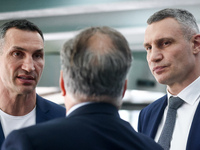 Brothers Vitali Klitschko and Wladimir Klitschko are seen during the NATO Summit at the IFEMA congress centre in Madrid, Spain on June 29, 2...