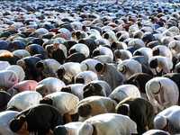 Indonesian Muslims perform their prayer during the Eid al-Adha celebrations at a field in Bogor, West Java, Indonesia on July 9, 2022. Musli...