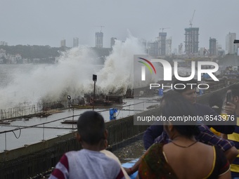 People enjoy the high Tides in Mumbai, India, 15 July, 2022.  (