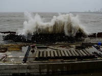Huge waves hit the coastal road under construction site during high Tides in Mumbai, India, 15 July, 2022.  (