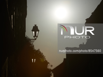 The sun is seen in a street of  Toulouse. Due to a 'heat plume' coming from North Africa and to an anticyclone, France is breaking heat reco...