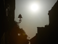 The sun is seen in a street of  Toulouse. Due to a 'heat plume' coming from North Africa and to an anticyclone, France is breaking heat reco...