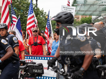 Trump supporters in the 1776 Restoration Movement set out on a march with the assistance of Metropolitan (DC) Police following Donald Trump'...