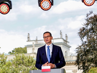 The Prime Minister of Poland, Mateusz Morawiecki speaks at a press conference at Royal Baths Park, Palace on the Isle in Warsaw, Poland for...