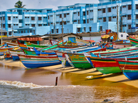 Fishing boats along the beach in Vizhinjam, Thiruvananthapuram (Trivandrum), Kerala, India on May 26, 2022. (