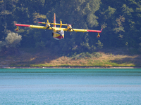 A Canadair of the Fire Brigade, used for fire emergencies, during manoeuvring before water refuelling, at Lago del Salto, in the province of...