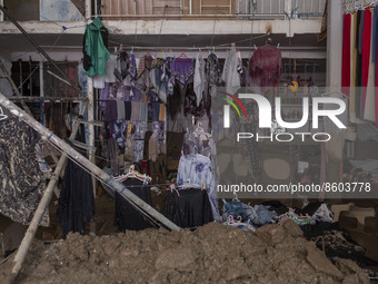 An interior view of a shop which is covered with mud after flash flooding in the flooded village of Imamzadeh Davood in the northwestern par...