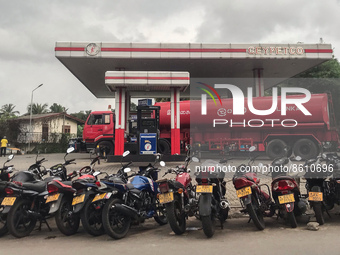 Motorcycles are parked in front of a Ceylon Petroleum Corporation gas station in Colombo, Sri Lanka, hoping to buy fuel on July 31, 2022, Pe...