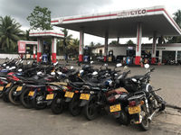 Motorbikes are parked in front of a Ceylon petroleum corporation fuel station in Colombo, Sri Lanka, hoping to buy fuel on July 31, 2022. (