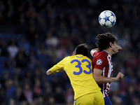 SPAIN, Madrid:Atletico de Madrid's Montenegrin Defender Stefan Savic and Astana´s Slovenian Defender Branko Ilic during the UEFA Champions L...