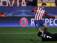 SPAIN, Madrid:Atletico de Madrid's Spanish forward Fernando Torres and Astana´s Kazakhstani goalkeeper Nenad Eric during the UEFA Champions...