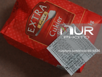 A sales receipt with the date of purchase of sugar from July 23, 2022, next to the pack of sugar with the expiry date of July 13, 2022.
The...