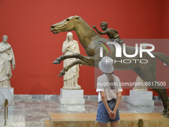 Tourists visit the national archaeological museum in Athens on August 2, 2022. According to british press over 3 million tourists visited Gr...