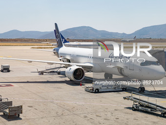 Lufthansa Airbus A321neo aircraft as seen parked and docked to an airbridge in Athens International Airport ATH. The modern A321 NEO airplan...