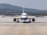 British Airways Airbus A320 aircraft as seen taxiing for departure to London Gatwick Airport LGW from the Greek capital, Athens Internationa...