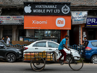 A Xiaomi store as seen in Kolkata , India , on 5 August 2022 . Indian government tightens oversee over Chinese phone manufacture Xiaomi over...
