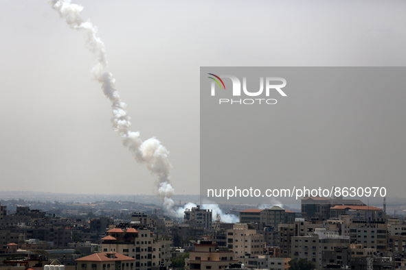 A picture taken on August 6, 2022, shows Palestinian rockets fired from Gaza City in retaliation to earlier Israeli air strikes. 