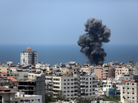 Smoke billows from an Israeli air strike in  Gaza City, on August 6, 2022.  (