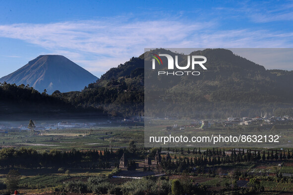Mountain scenery and hills planted with vegetables are seen in the Dieng mountain area in Banjarnegara, Central Java province, Indonesia, on...