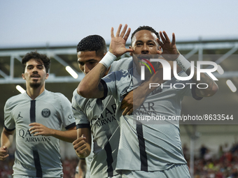 Neymar of PSG celebrates after scoring his sides first goal during the Ligue 1 match between Clermont Foot and Paris Saint-Germain at Stade...
