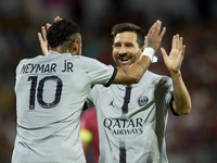 Lionel Messi of PSG celebrates after scoring his sides first goal during the Ligue 1 match between Clermont Foot and Paris Saint-Germain at...