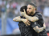 Sergio Ramos and Lionel Messi of PSG greets each others during the warm-up before the Ligue 1 match between Clermont Foot and Paris Saint-Ge...