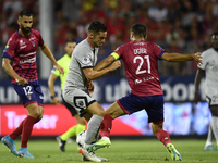 Pablo Sarabia of PSG and Florent Ogier of Clermont Foot 63 compete for the ball during the Ligue 1 match between Clermont Foot and Paris Sai...