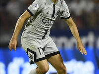 Vitinha of PSG in action during the Ligue 1 match between Clermont Foot and Paris Saint-Germain at Stade Gabriel Montpied on August 6, 2022...