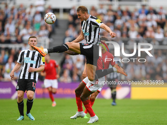 Dan Burn of Newcastle United clears the ball during the Premier League match between Newcastle United and Nottingham Forest at St. James's P...