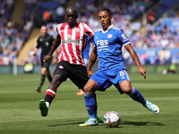 Youri Tielemans of Leicester City under pressure from Yoane Wissa of Brentford during the Premier League match between Leicester City and Br...