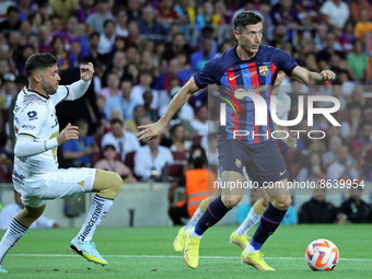 Robert Lewandowski and Arturo Ortiz during the match between FC Barcelona and Pumas UNAM, corresponding to the Joan Gamper tropphy, played a...
