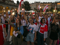 Members of the local Belarusian and Ukrainian diaspora supported by local Cracovians during the Solidarity with Belarus 2022 march, in the c...