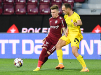 Claudiu Petrila in action against Luka Simunovic during UEFA Europa Conference League, 3rd preliminary round: CFR Cluj v. Şahtior Soligorsk,...