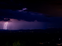 Lightning during a thunderstorm illuminates the evening of 11 August 2022, in the province of Rieti, Italy.  (