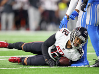 Atlanta Falcons wide receiver KhaDarel Hodge (12) is tackled by Detroit Lions safety DeShon Elliott (5) during the first half of an NFL pres...