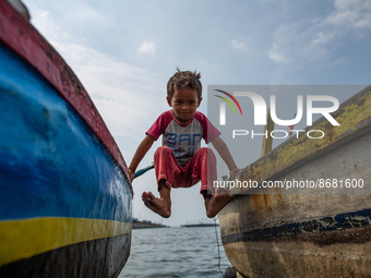 Children play at a fishermen village in the North of Indonesia capital Jakarta on 17 August 2022. 
 (
