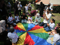 Palestinians participate in a fun day as part of community mental health programs after the latest conflict between Israel and Palestinian m...